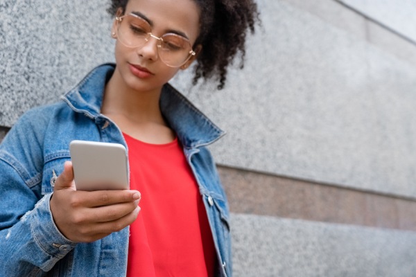 girl-looking-at-smartphone-screen